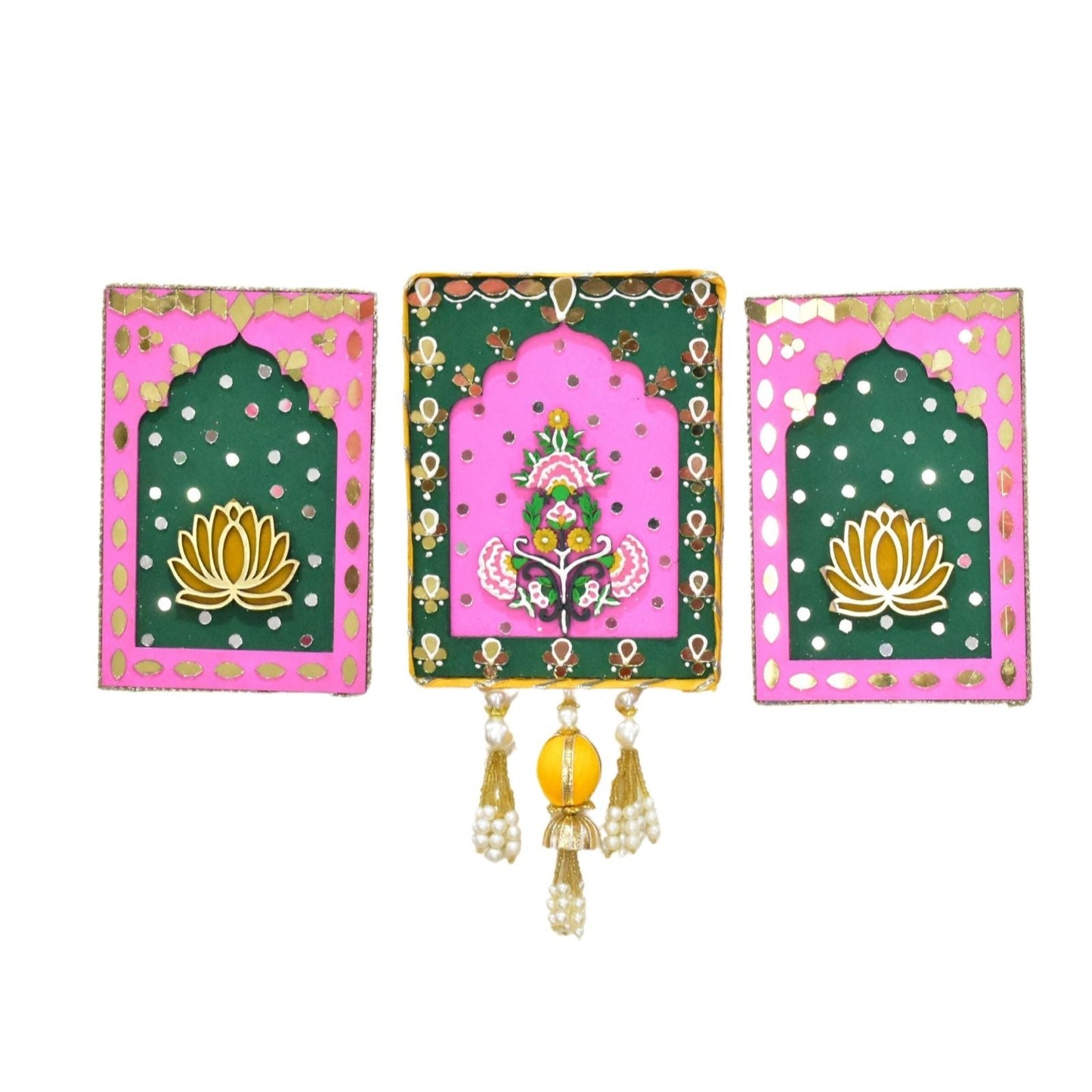 Set of three decorative wooden plaques with floral designs and tassels on a white background