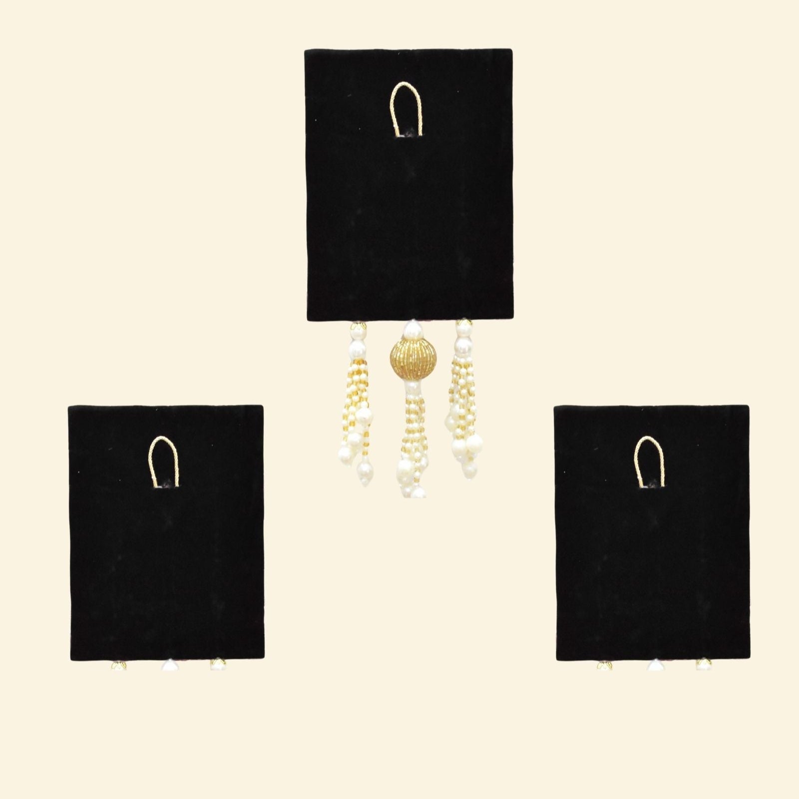 Black velvet display on a beige background