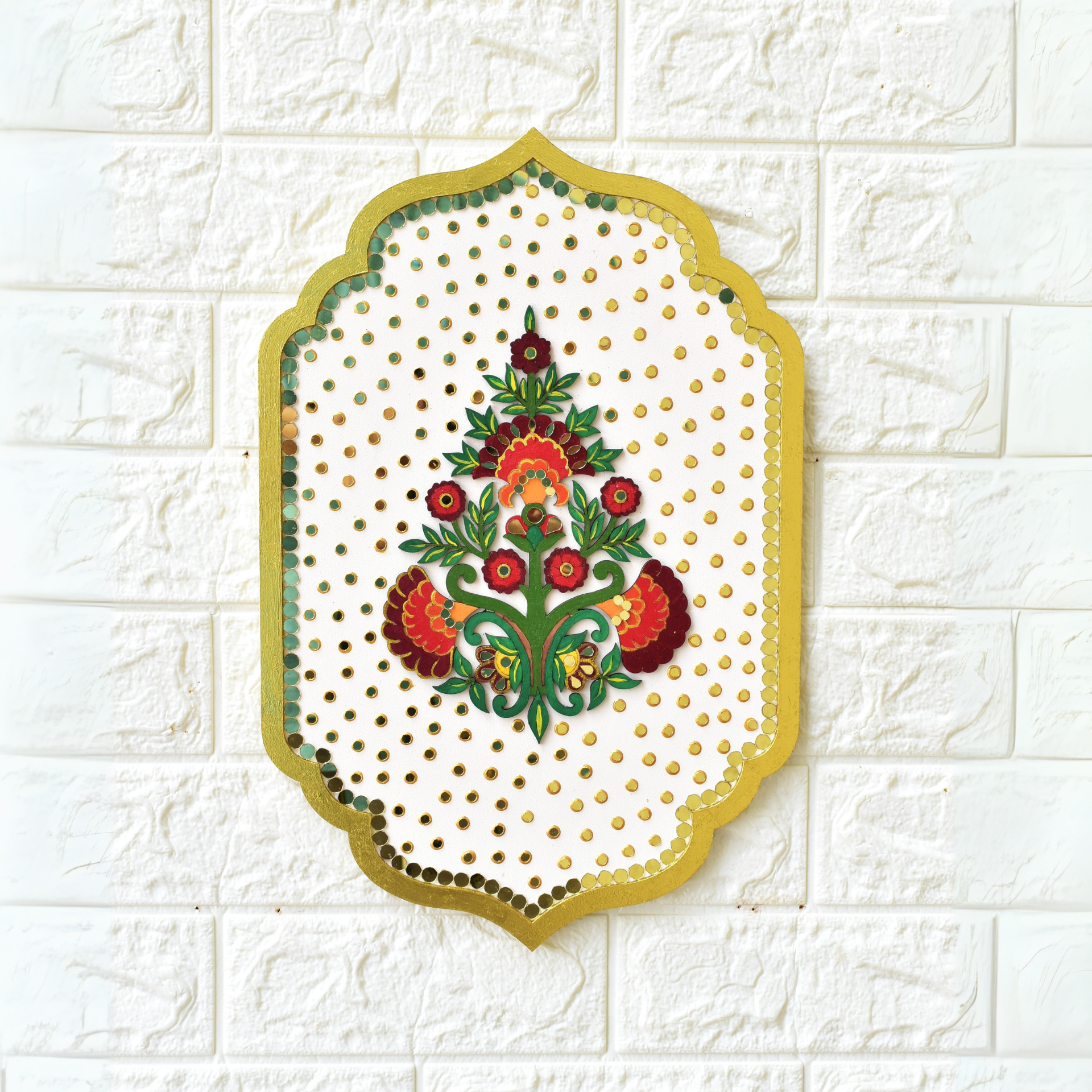 Decorative wall art with floral design on a textured white background