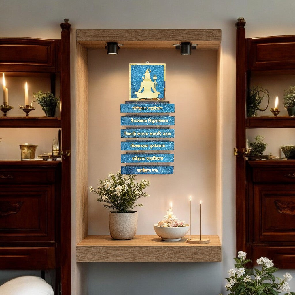 Shiva wall art with blue background and gold text in a home setting.