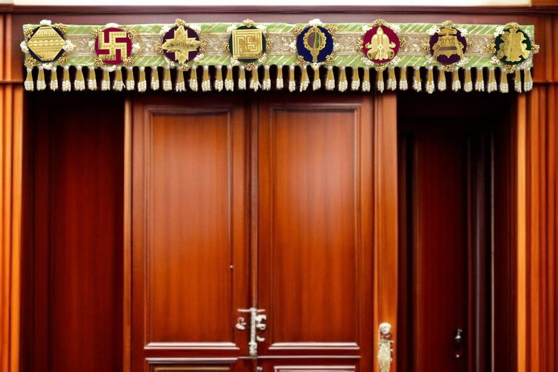 Green handcrafted Ashthamangala toran with traditional mirror work and 8 sacred symbols, ideal for ethnic home décor, door hanging, or pooja room decoration