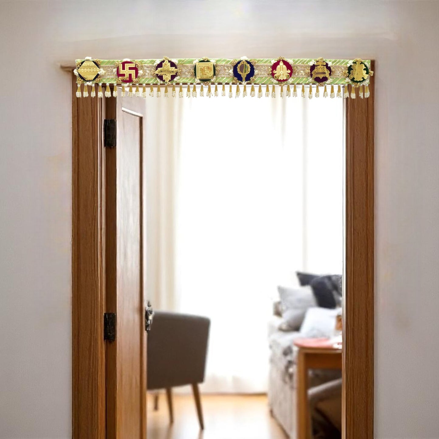 Green handcrafted Ashthamangala toran with traditional mirror work and 8 sacred symbols, ideal for ethnic home décor, door hanging, or pooja room decoration