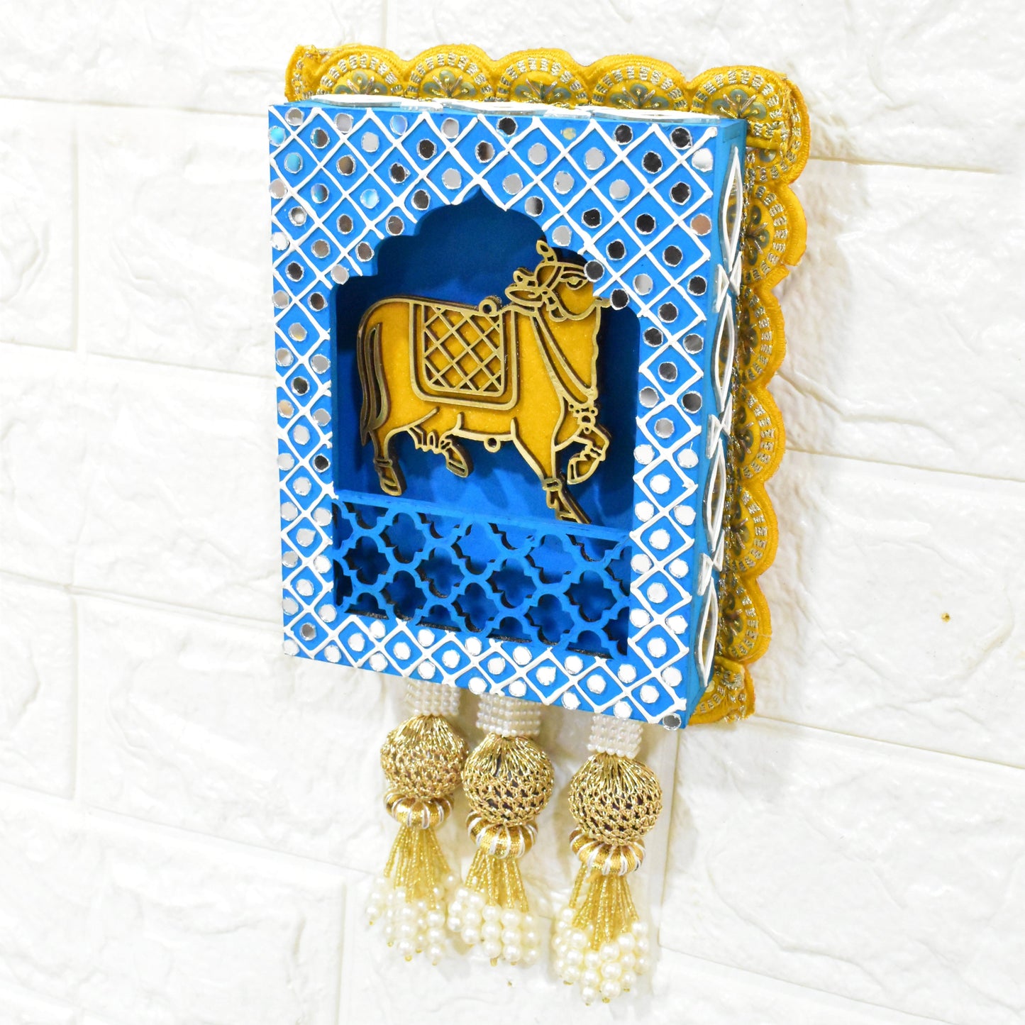 Wall hanging in Blue Indian and traditional art on white textured wall