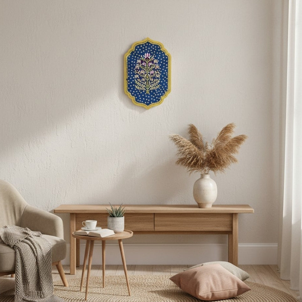 Nestled living room with a wooden console table, armchair, and blue floral wall art.