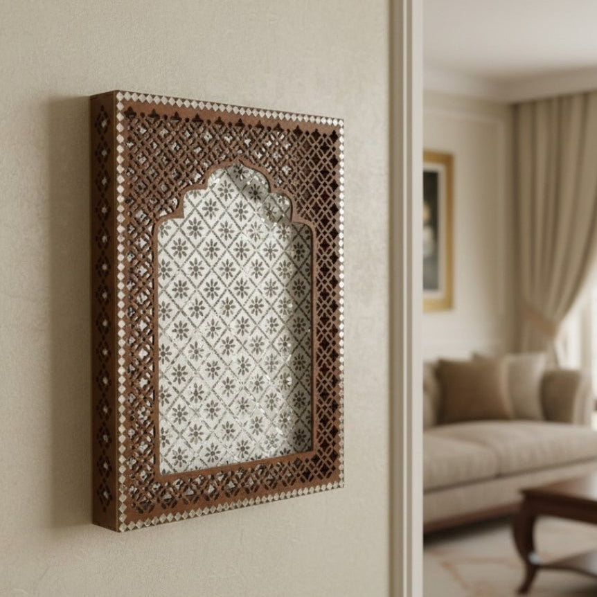 Decorative Brown Jharokha wall decor with mirror & intricate lattice design in a living room setting.