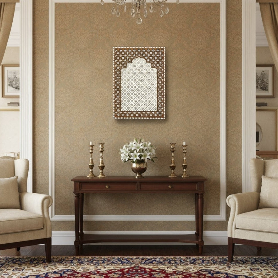 Brown Jharokha wall hanging in the Living room setting with chairs, a wooden console table, and decorative elements.