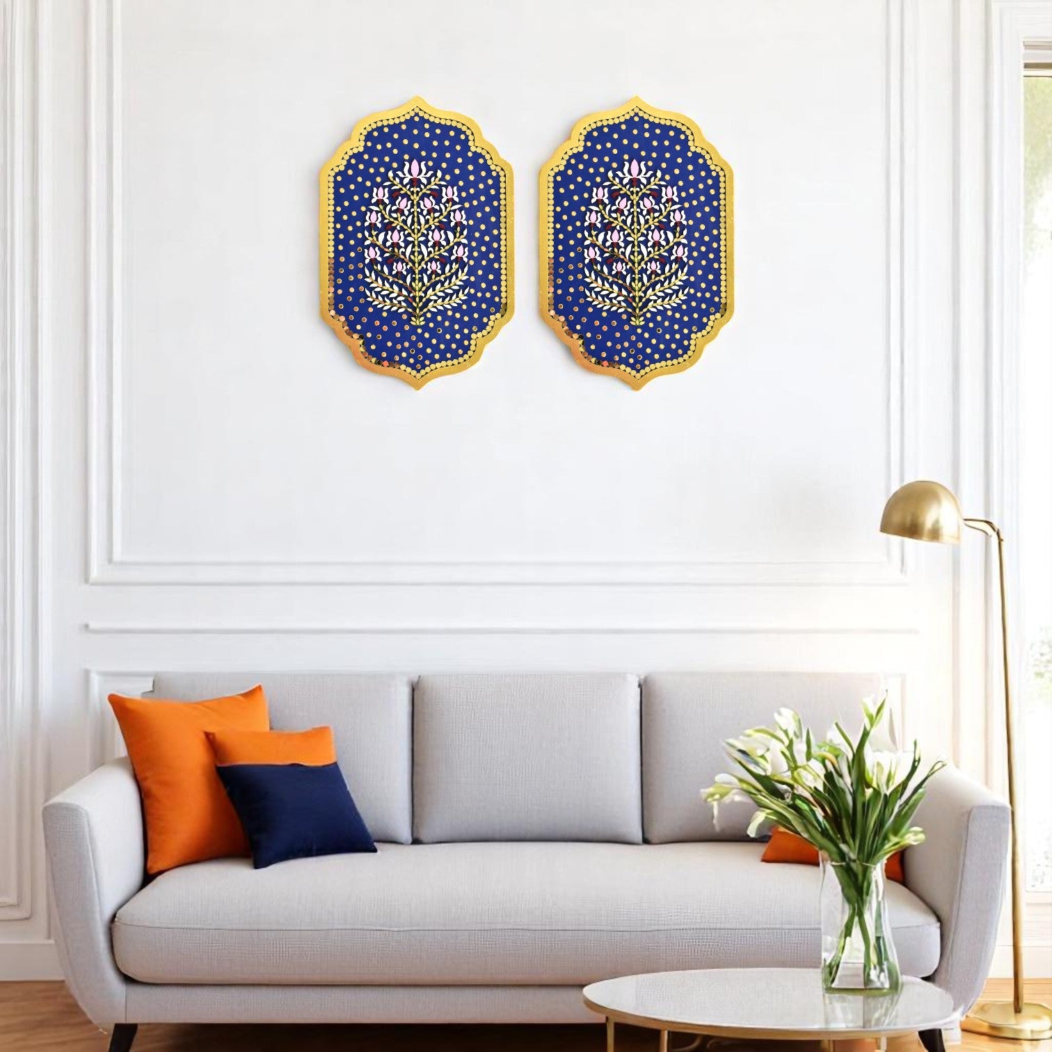 Decorative wall art above a sofa with colorful cushions in a living room setting.