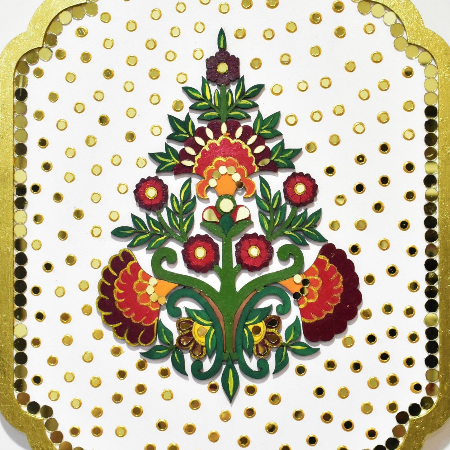 Decorative card with floral design and gold border on a white background