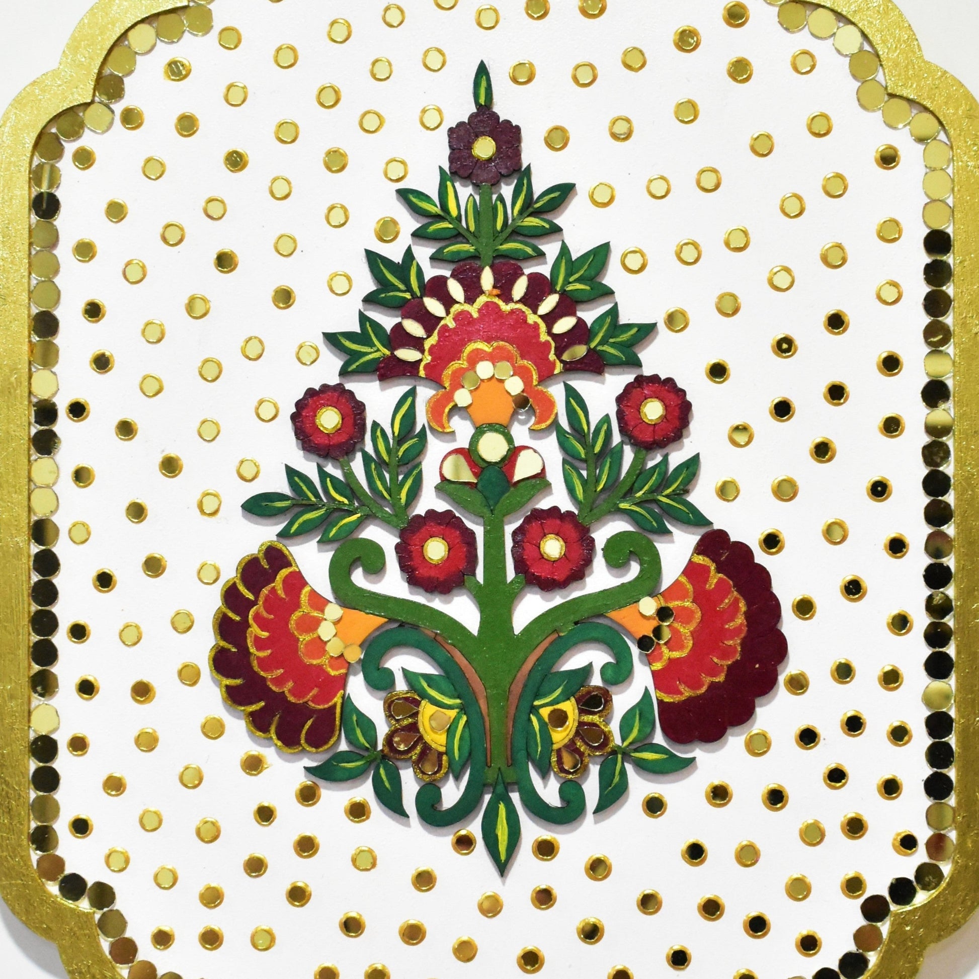 Decorative card with floral design and gold border on a white background