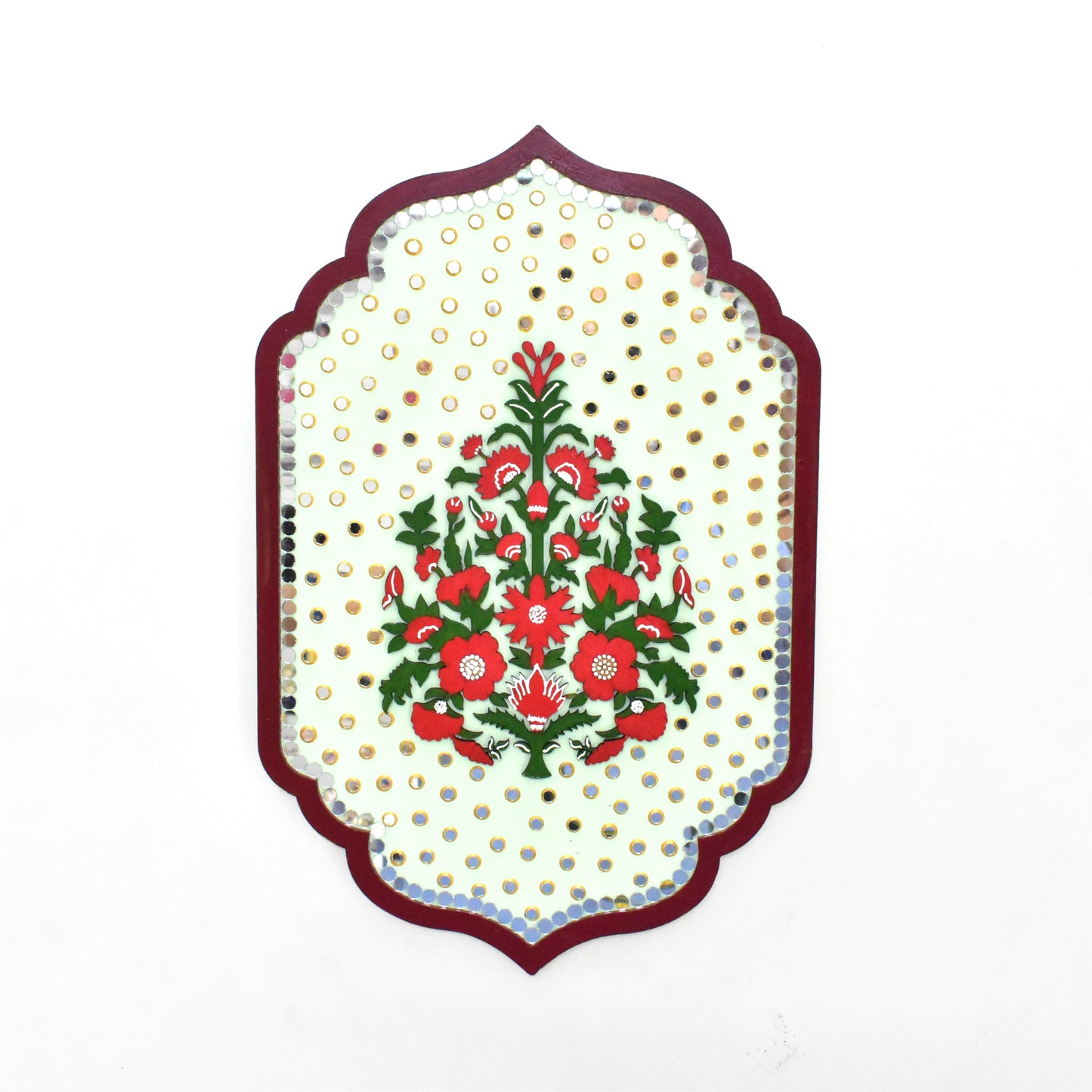 Decorative mirror with floral design and gold accents on a white background