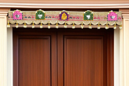 Decorative door toran with colorful elements on a wooden door