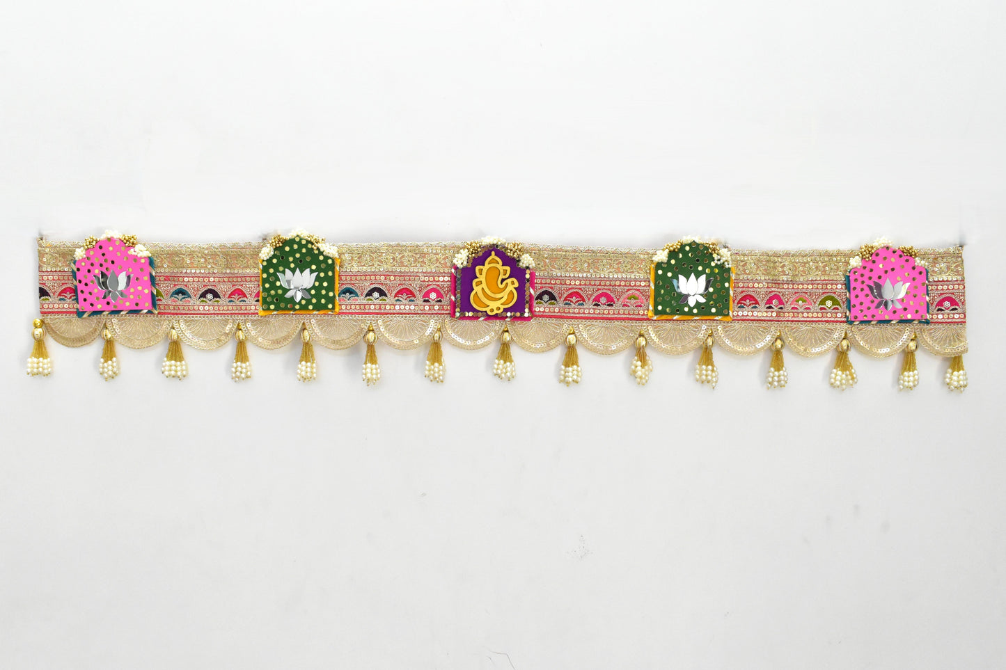 Decorative toran with colorful patterns and gold elements on a white background