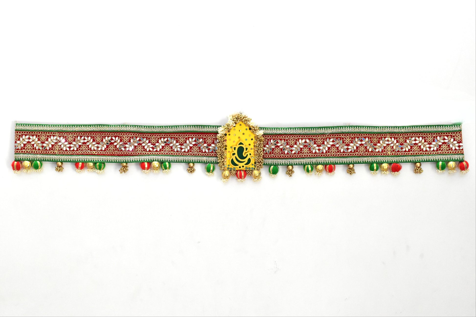 Decorative ganesha toran with green and red patterns and colorful beads on a white background
