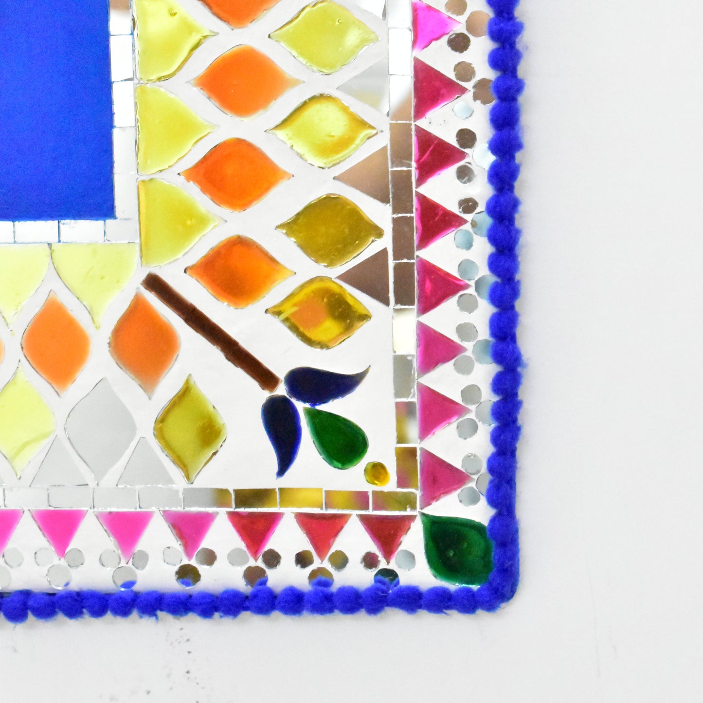 Colorful mosaic art with geometric patterns on a white background