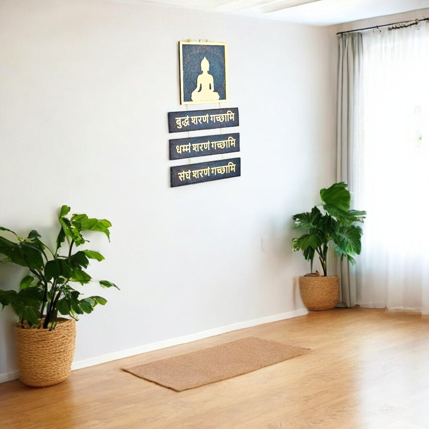 Meditation room with a Buddha mantra frame on the wall, plants, and a mat.