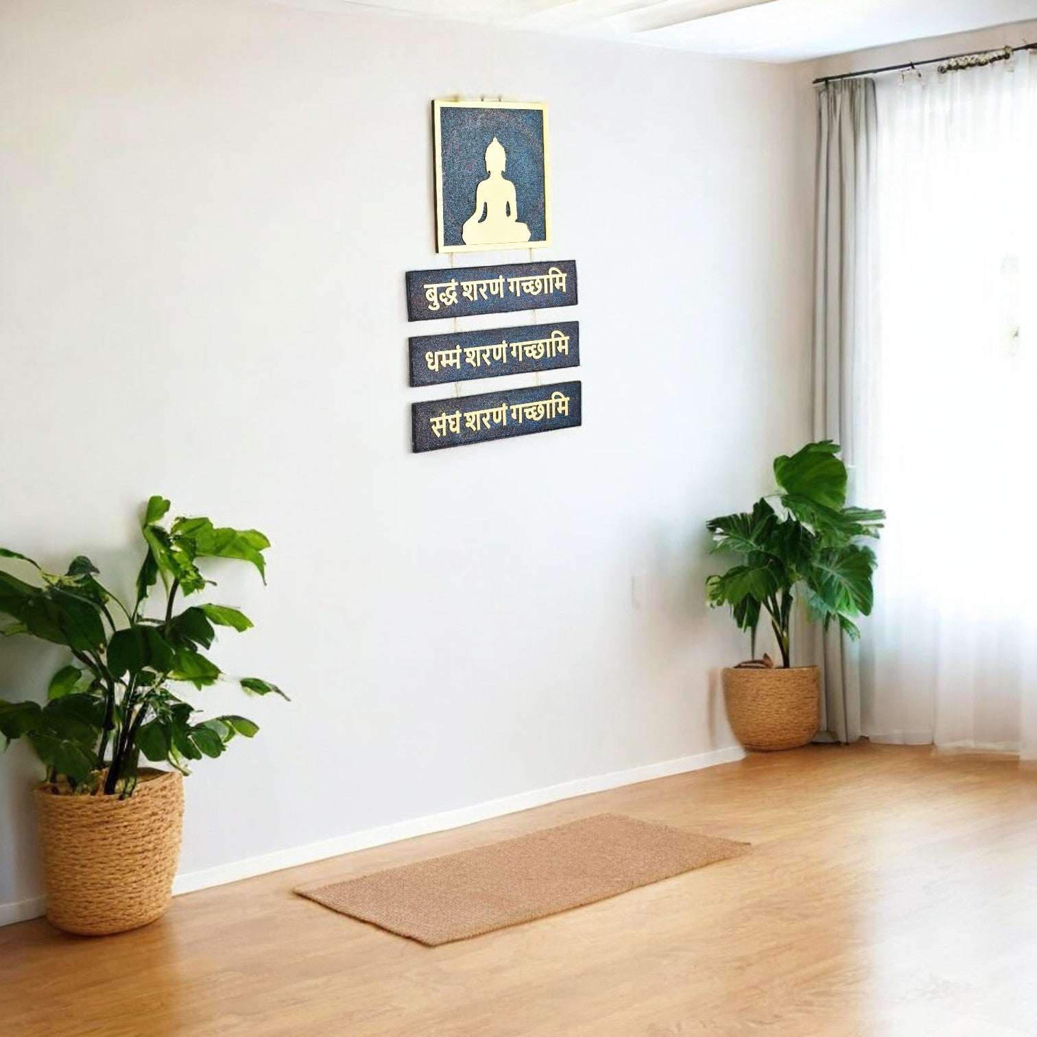 Meditation room with a Buddha mantra frame on the wall, plants, and a mat.
