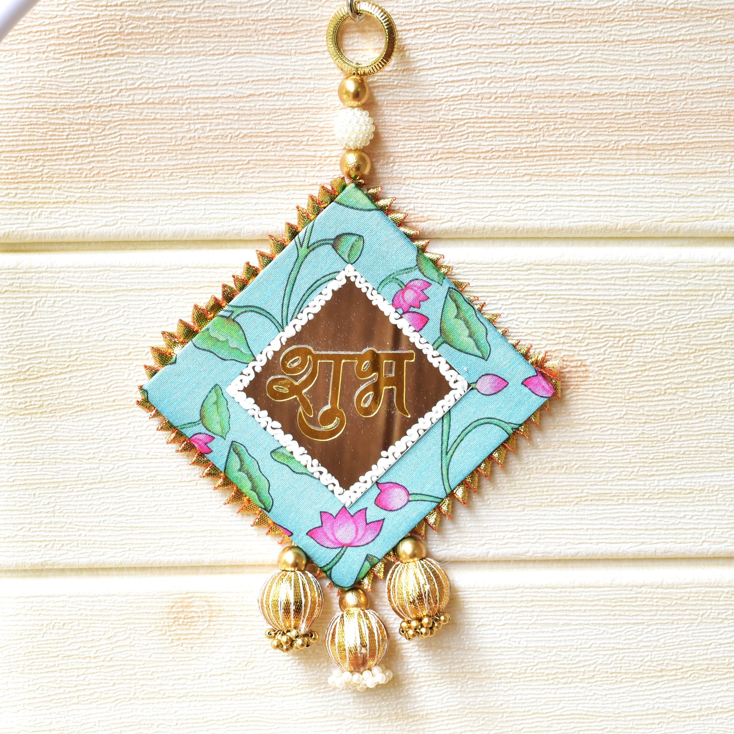 Decorative Shubh with floral design and gold accents