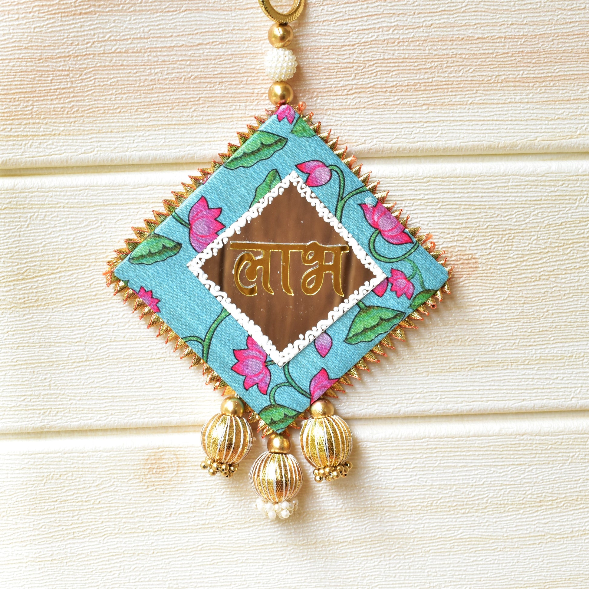 Decorative Sbubh Labh with floral design and gold accents