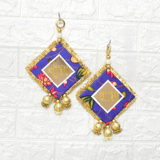 Decorative Shubh Labhs with colorful patterns and gold accents