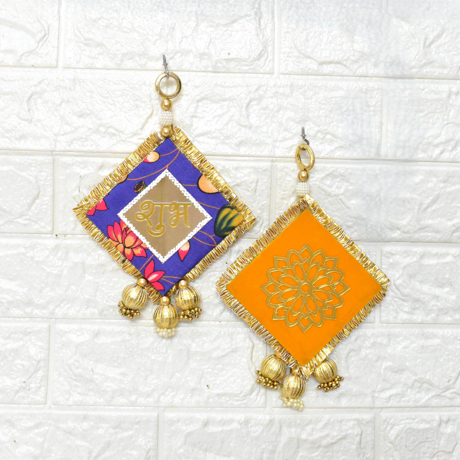 Two decorative Shubh Labhs with geometric designs