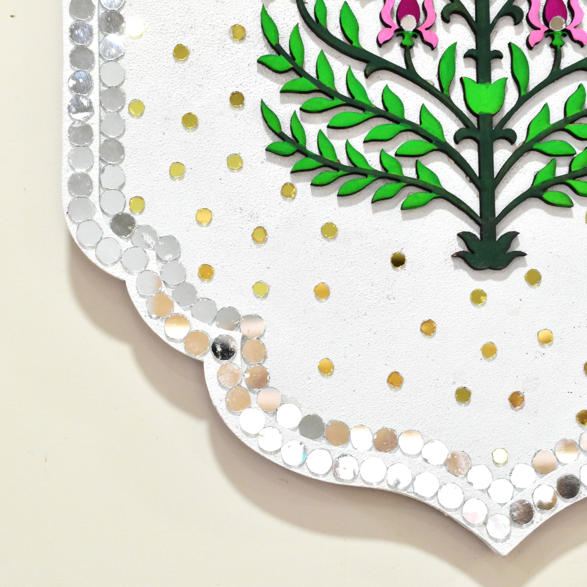 Decorative card with floral design and polka dot border mirror on a beige background