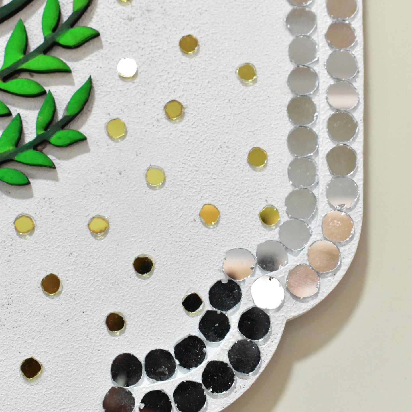 Decorative card with floral design and colorful polka dots on a white background