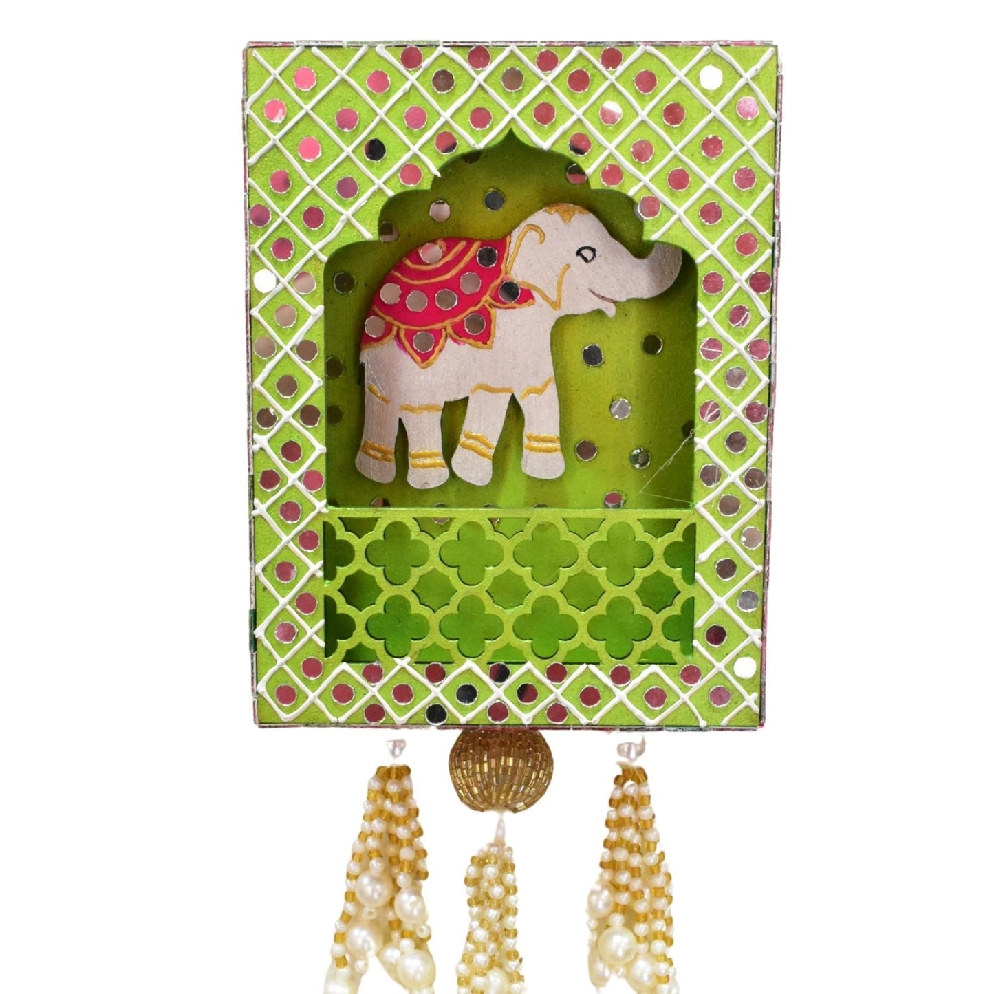Decorative elephant figurine in a green jharokha wall hanging with pearl hanging decorations on a white background