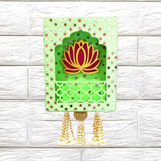 Green jharokha with pink lotus on a white textured wall