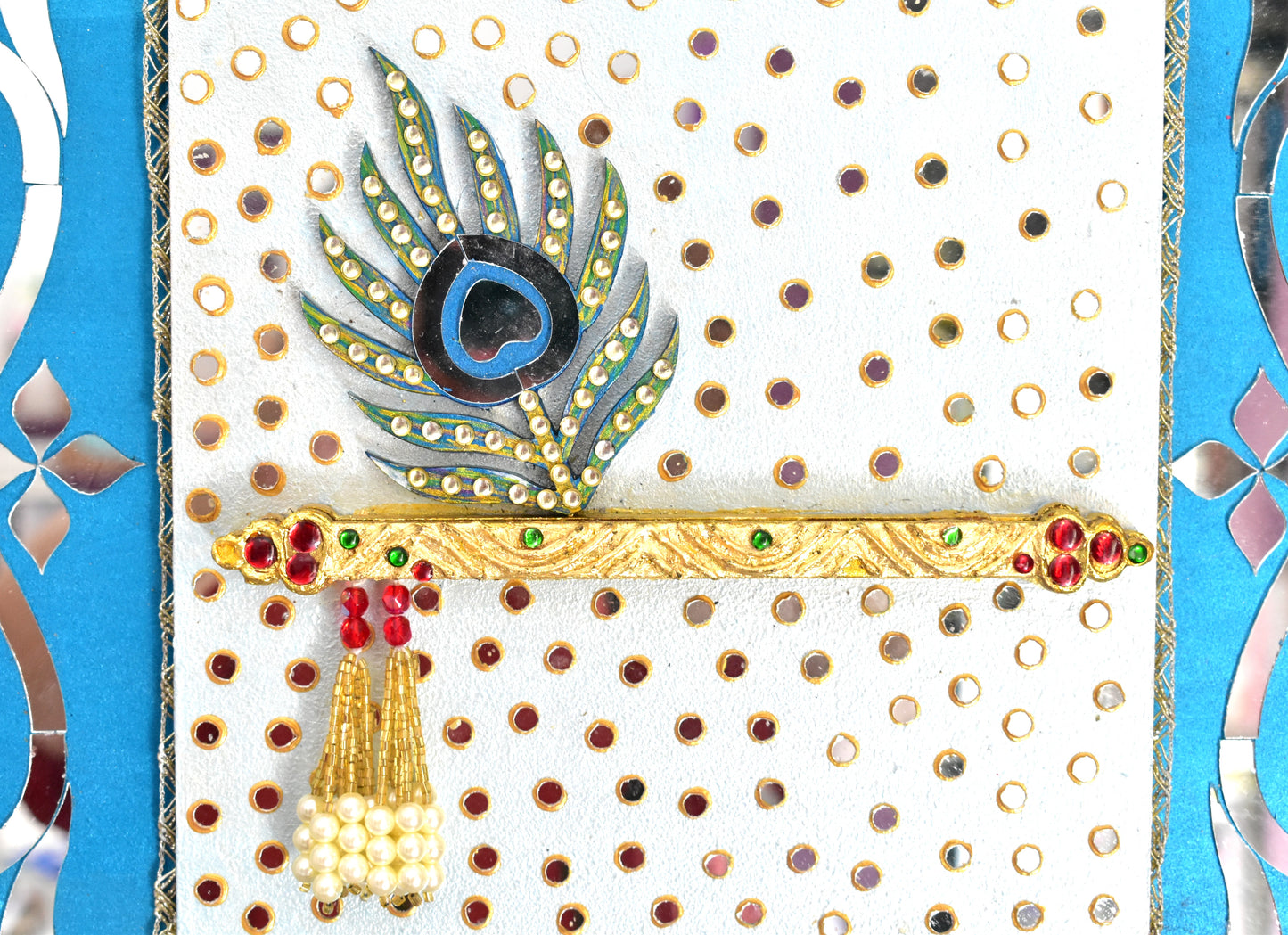 Closeup of Krishna Flute with Peacock Feather