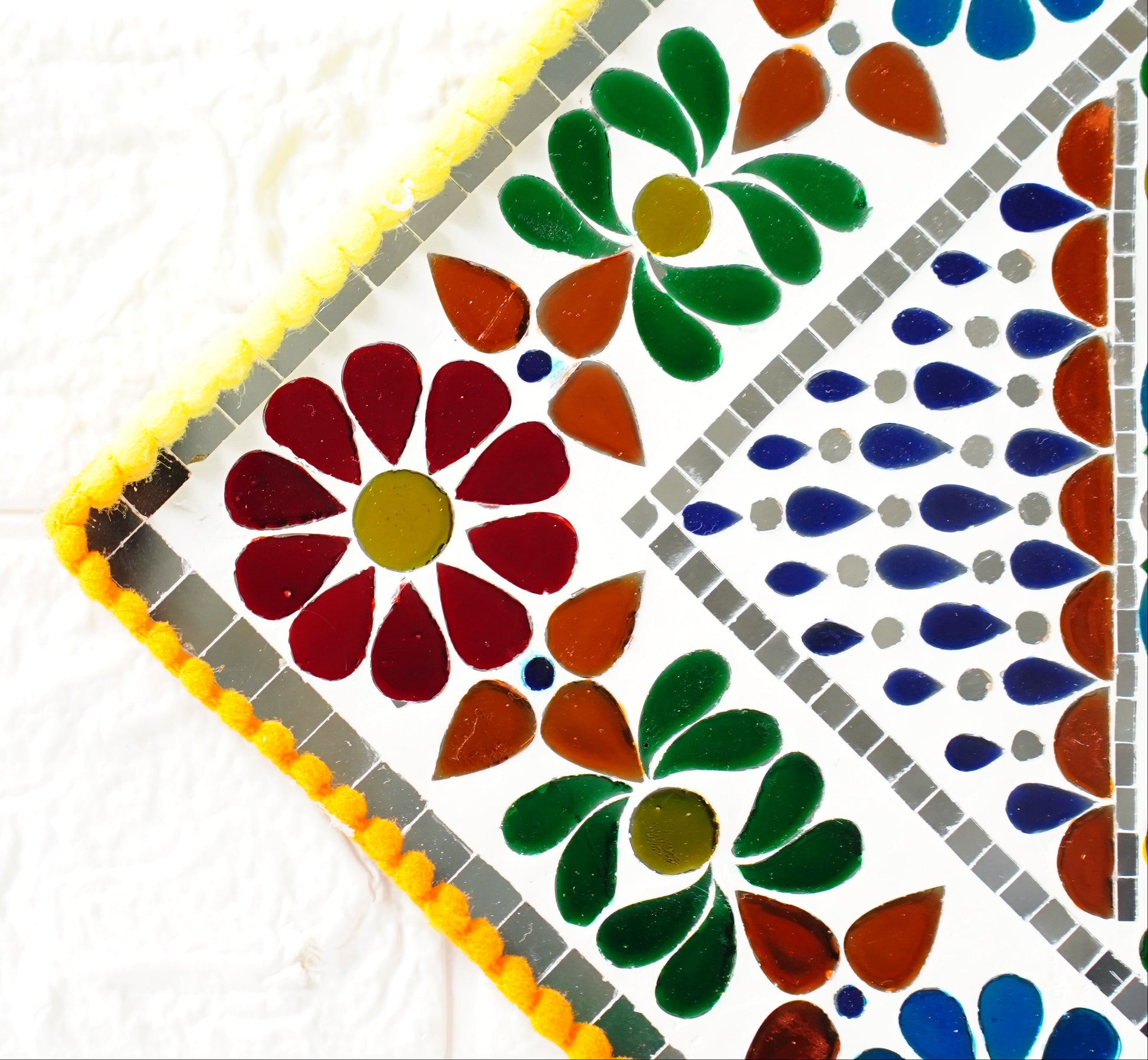 Close up of mirror mosaic wall art