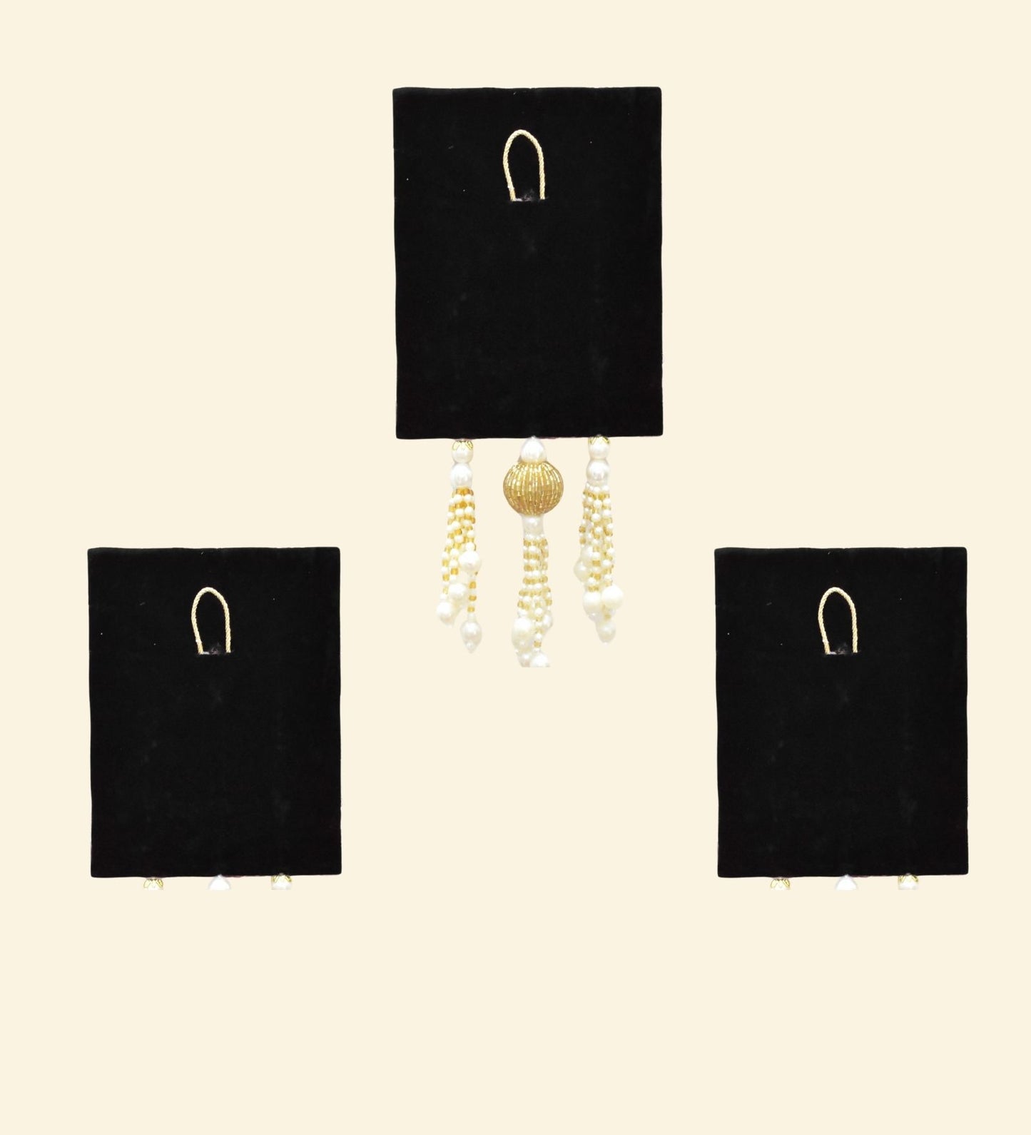 The back part of the jharokha with velvet showing the loops to hang