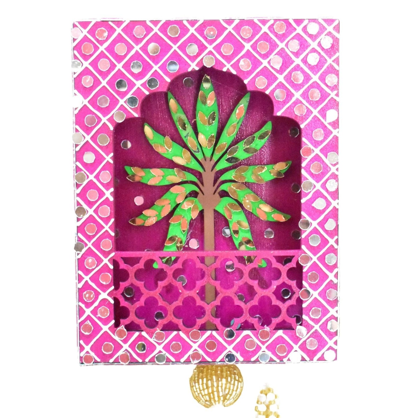 Decorative wall hanging with a tree design on a pink background, featuring tassels.