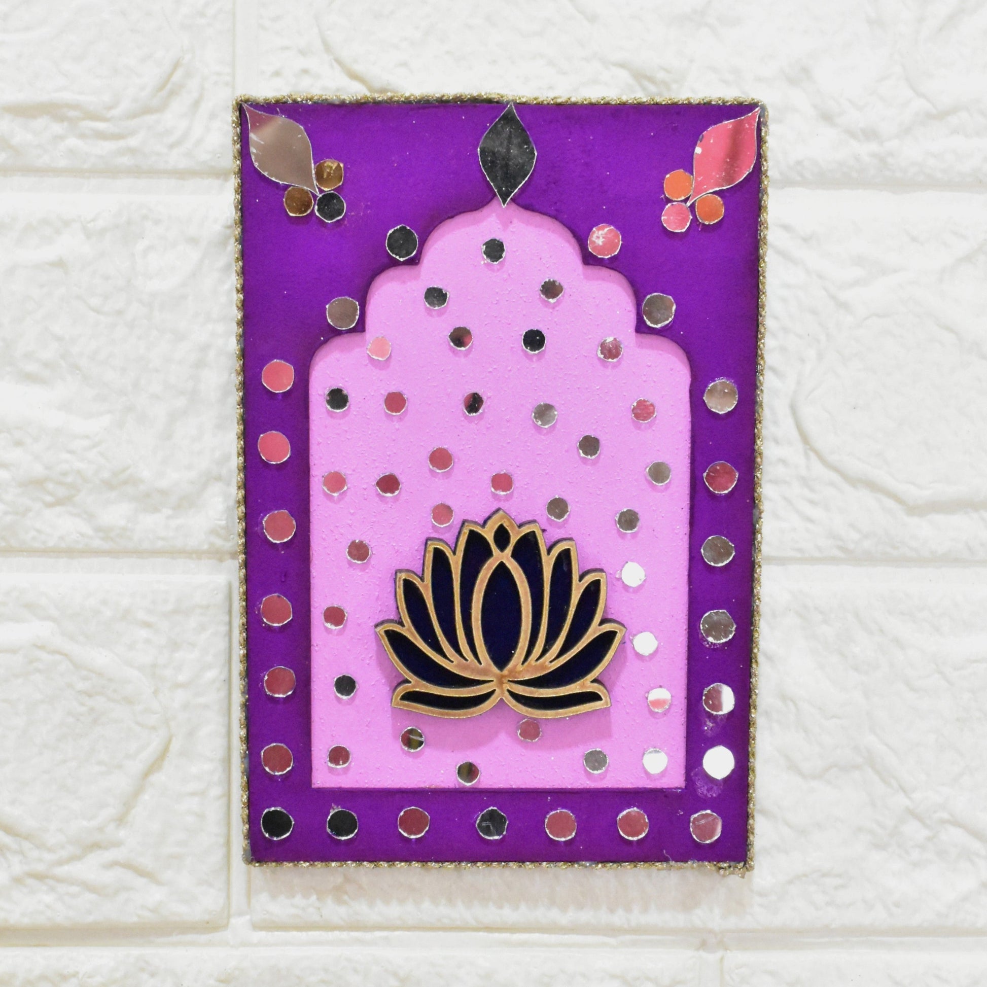 Decorative jharokha with a purple border and pink center with a lotus design on a textured white background.