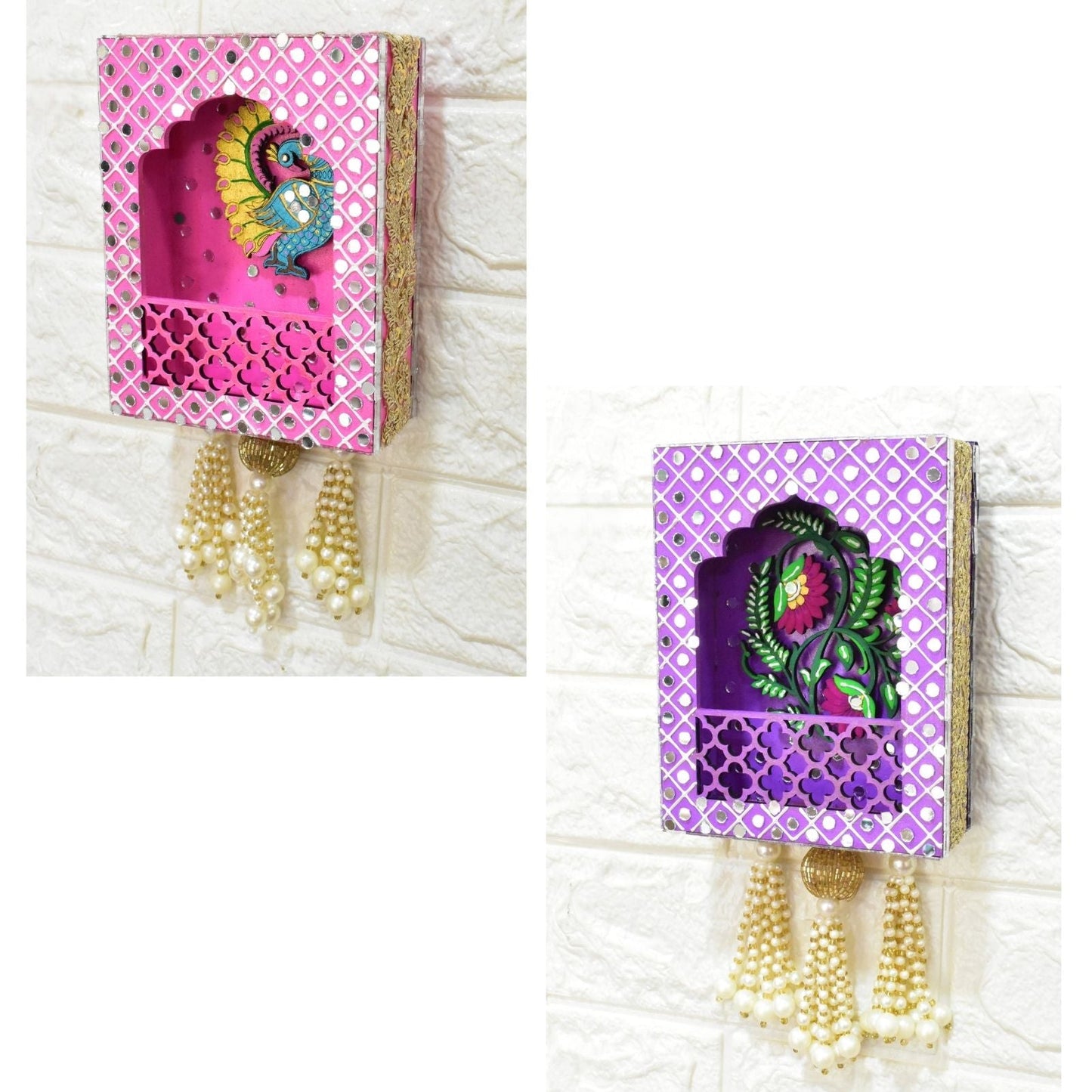 Two decorative wall hangings with colorful designs and pearl strands on a white background