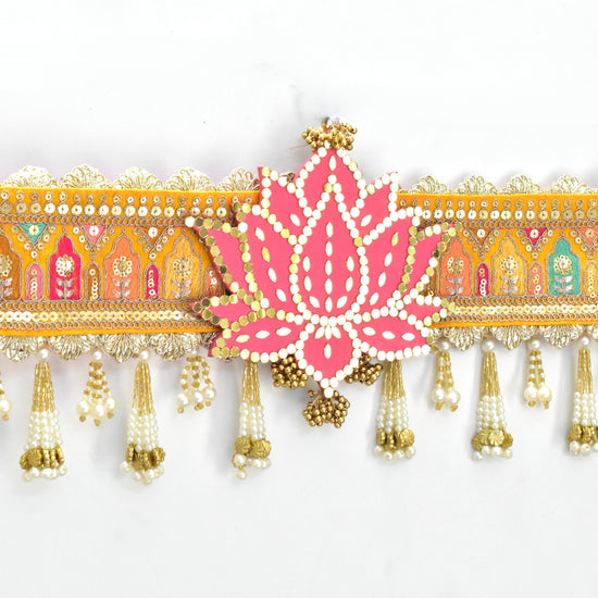 Decorative toran with pink lotus and yellow colour