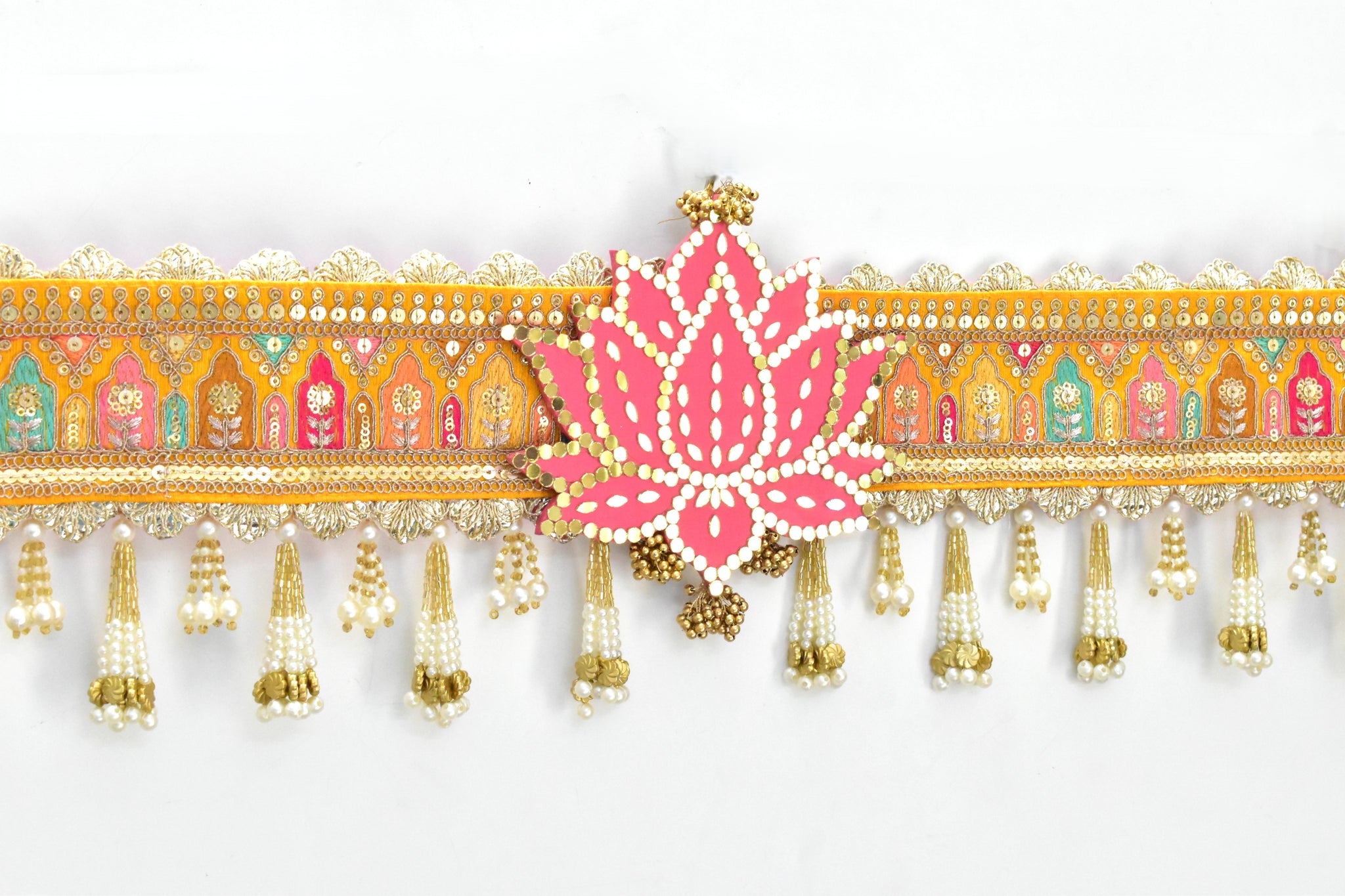 Decorative toran with pink lotus and yellow colour